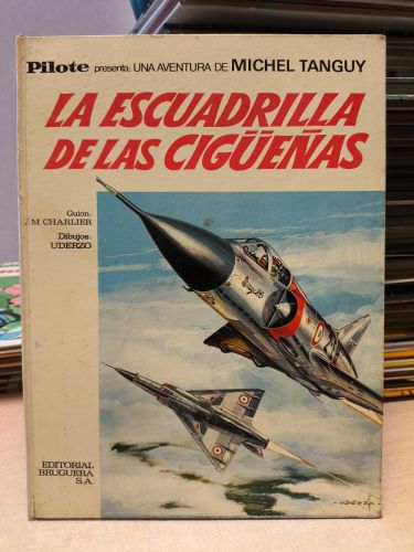 Portada del libro de MICHEL TANGUY: LA ESCUADRILLA DE LAS CIGÜEÑAS -BRUGUERA, 1968 - CHARLIER Y UDERZO. TAPA DURA 