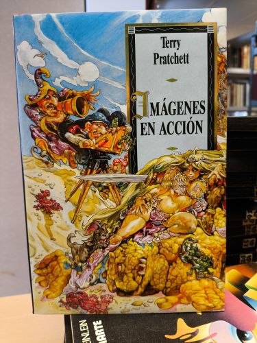 Portada del libro de IMAGENES EN ACCION - (MUNDODISCO 9) Gran Fantasy Martínez Roca. 1ª edición 1993 tapa dura