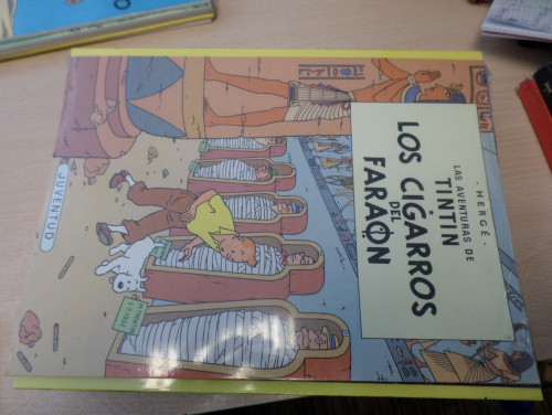 Portada del libro de LAS AVENTURAS DE TINTIN - LOS CIGARROS DEL FARAON ( NUEVO TODAVÍA CON PLÁSTICO)