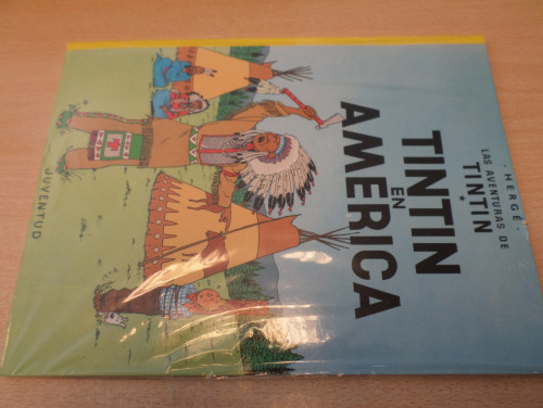 Portada del libro de LAS AVENTURAS DE TINTIN -TINTIN EN AMERICA ( NUEVO TODAVÍA CON PLÁSTICO)