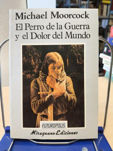 Portada del libro de EL PERRO DE LA GUERRA Y EL DOLOR DEL MUNDO - MICHAEL MOORCOCK -MIRAGUANO FUTUROPOLIS