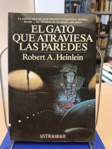Portada del libro de EL GATO QUE ATRAVIESA LAS PAREDES - ROBERT HEINLEIN - ED ULTRAMAR 1987