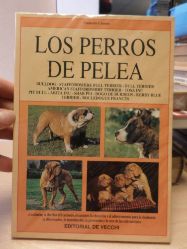 Portada del libro de LOS PERROS DE PELEA - DE VECCHI - UMBERTO CUOMO