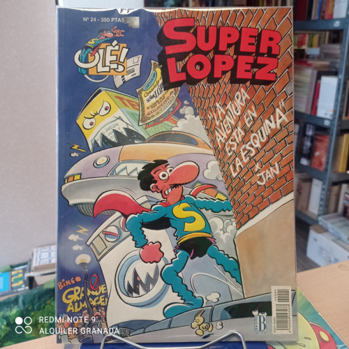 Portada del libro de SUPER LOPEZ: LA AVENTURA ESTA EN LA ESQUINA (COLECCIÓN OLE Nº 24) PORTADA RELIEVE